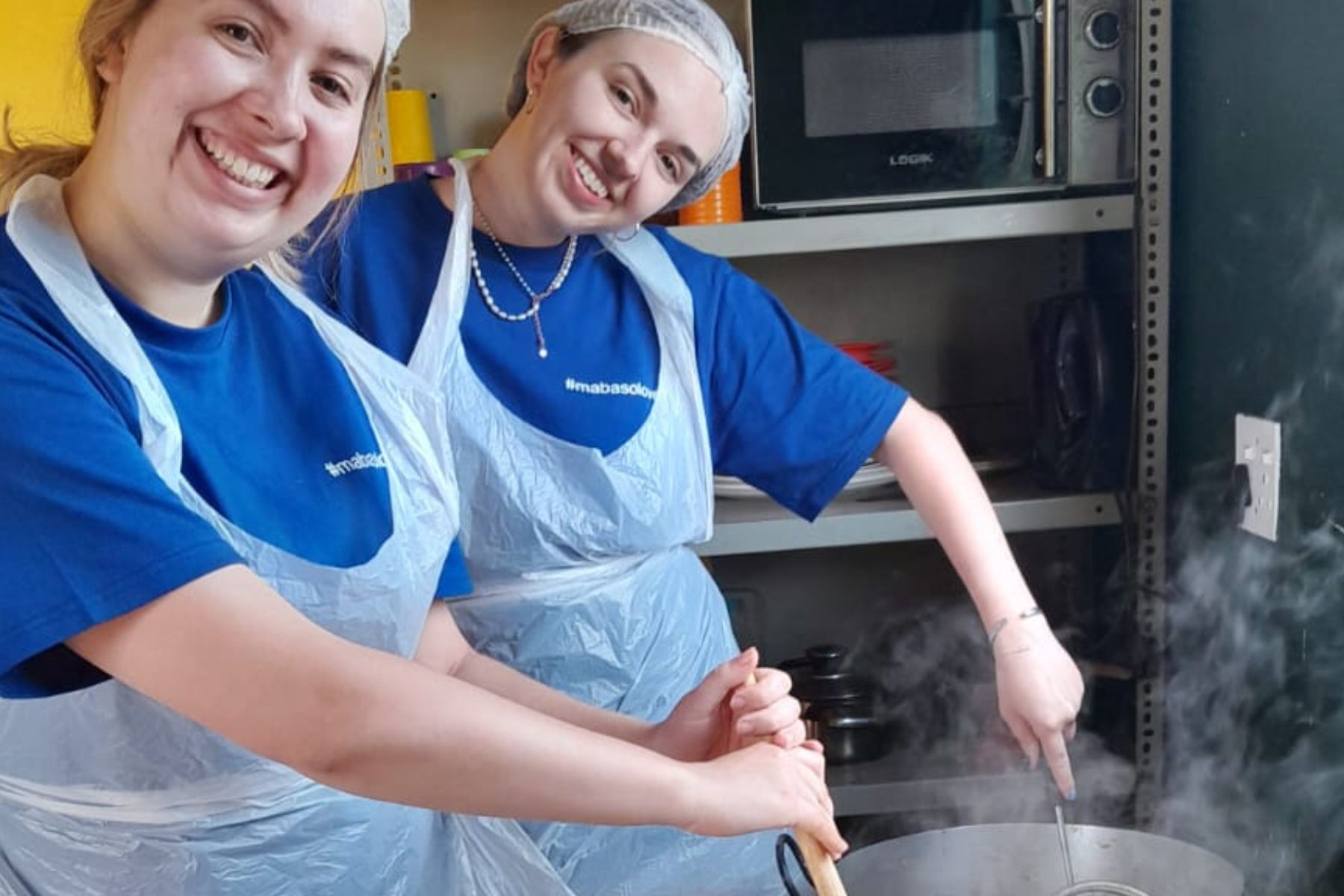 volunteers for the winnie mabaso foundation cooking