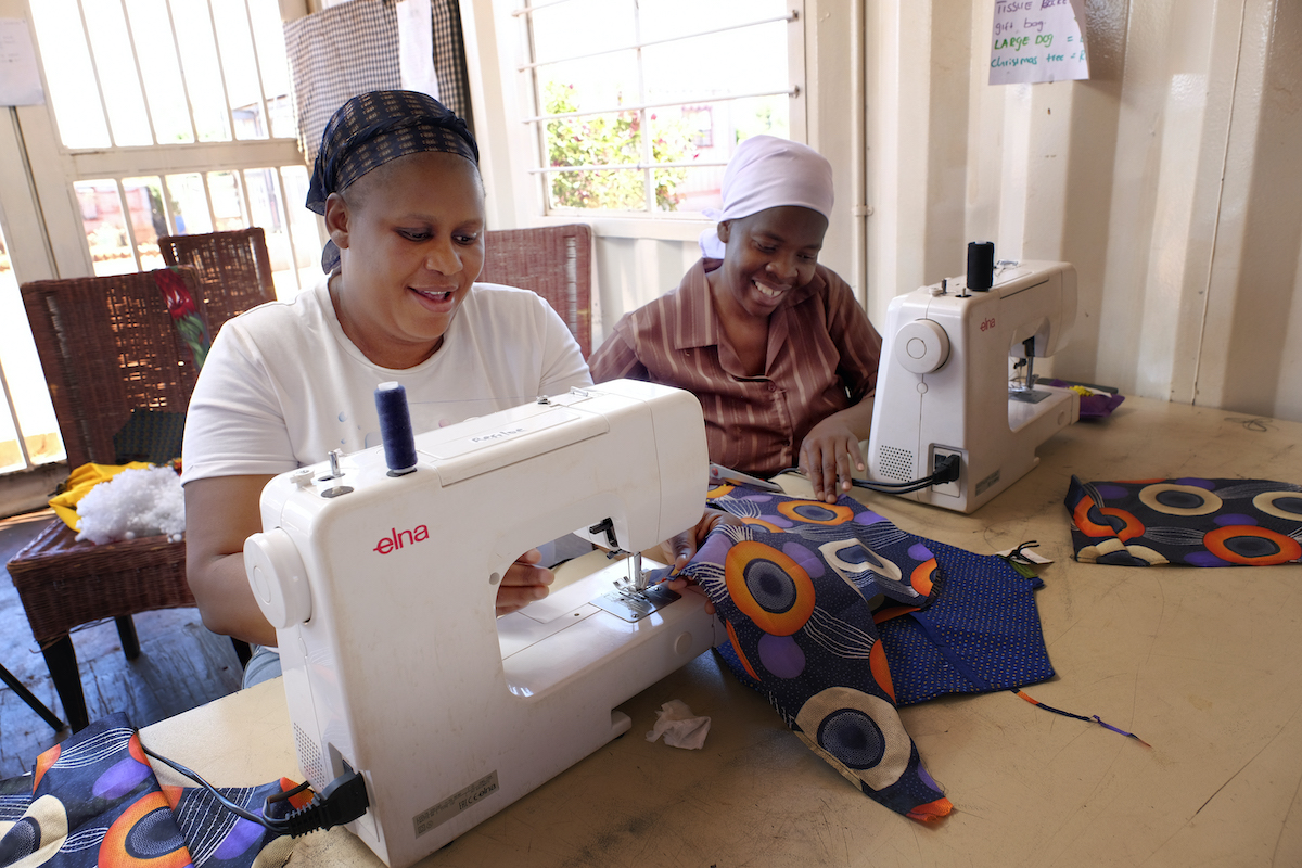 ladies sewing in sew amazing - the winnie mabaso foundation project