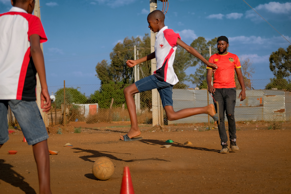 children playing football at the winnie mabaso foundation
